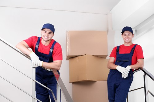 Fragile items carefully packed for a move in Kilburn