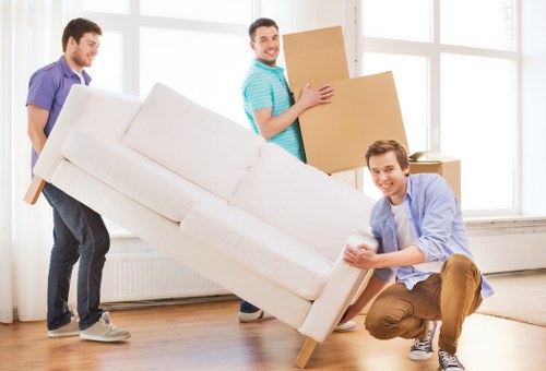 Prepared moving boxes for a removal van in Kilburn