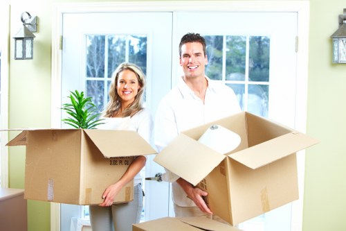 Careful loading of furniture removals vehicle in Kilburn