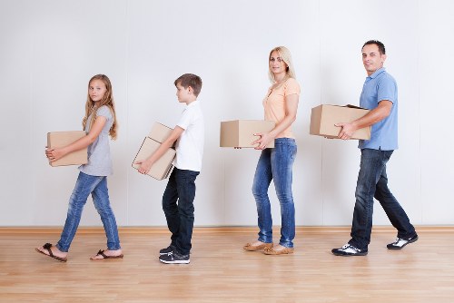 Loading furniture into a removal truck