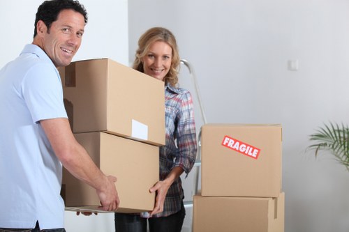 Packed boxes and home items prepared for a Kilburn van move